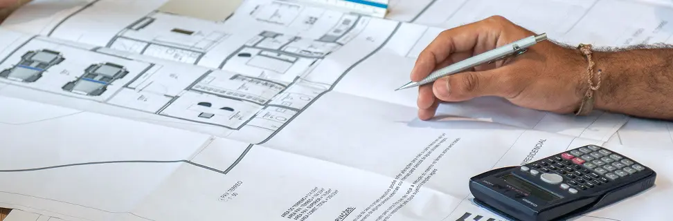 Planning a building project with house plans and a calculator